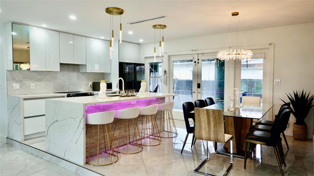 Photo of 1100 Buchanan Street, Hollywood, FL 33019 (MLS # B26022357)