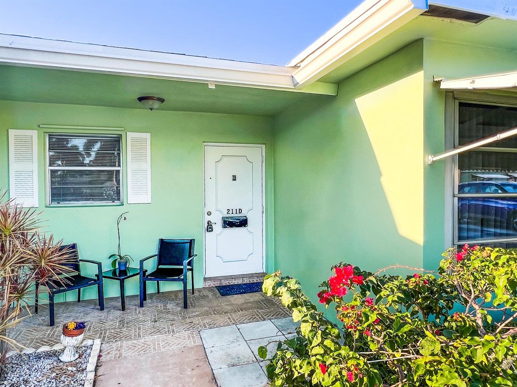 Photo of 211 Country Lane #D, Boynton Beach, FL 33435 (MLS # R10982146)