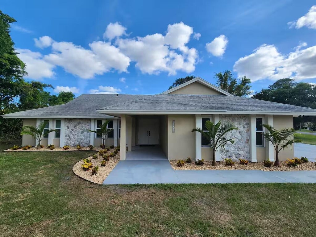 Photo of 2981 SE Dalhart Road, Port Saint Lucie, FL 34952 (MLS # R11069863)