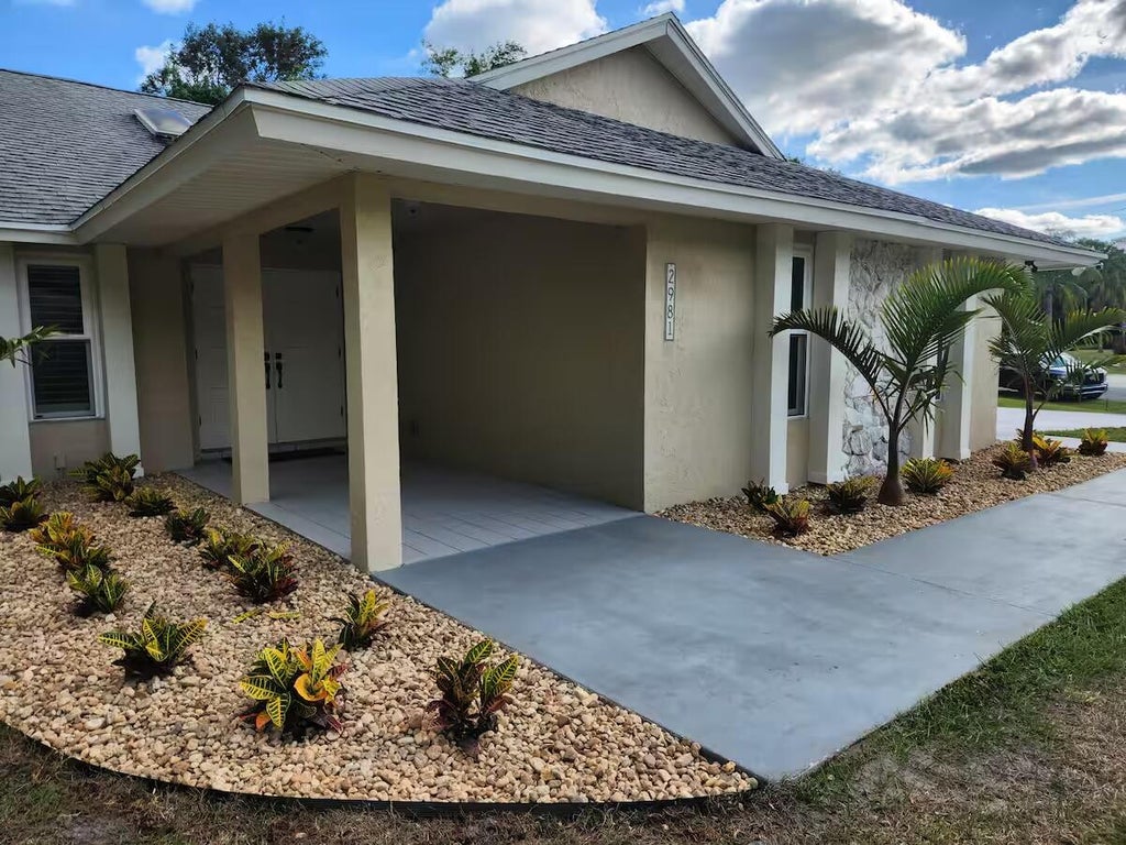 Photo of 2981 SE Dalhart Road, Port Saint Lucie, FL 34952 (MLS # R11069863)