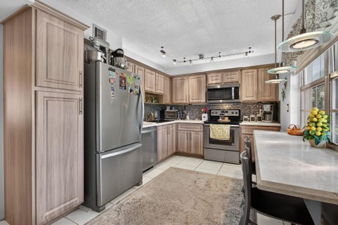 Photo of 806 Cypress Grove Lane #304, Pompano Beach, FL 33069 (MLS # B26059504)