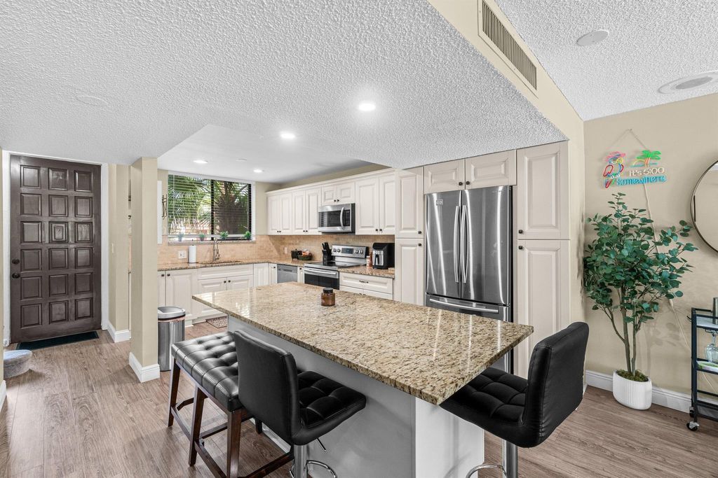 Photo of 4527 Luxemburg Court, Lake Worth, FL 33467 (MLS # R11124488)