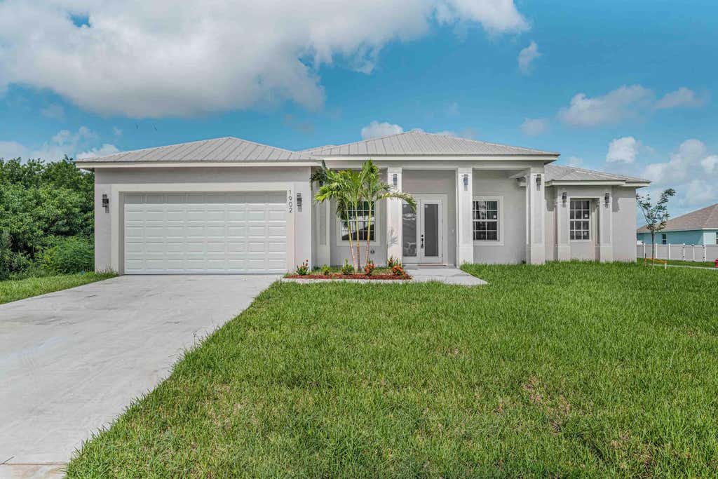 Photo of 1915 SW GLENCO Street, Port Saint Lucie, FL 34953 (MLS # B26051759)