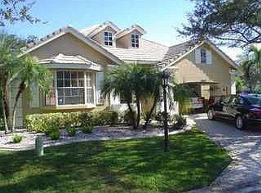 Stunning rare find in the prestigious gated golf community of Eagle Trace! 3/2 Split Bedroom Plan with Jack and Jill Bathroom. Beautiful new flooring, paint and updates. Possible 4th bedroom or office. Wonderful lot (no backyard neighbors) that leads to canal. Great schools & location within minutes to major highways, top restaurants and beaches.  Currently the lowest priced home in Eagle Trace and one of the lowest priced in Coral Springs!