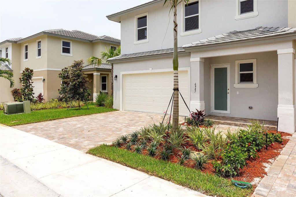 Photo of 6990 Pines Circle, Coconut Creek, FL 33073 (MLS # F10464294)