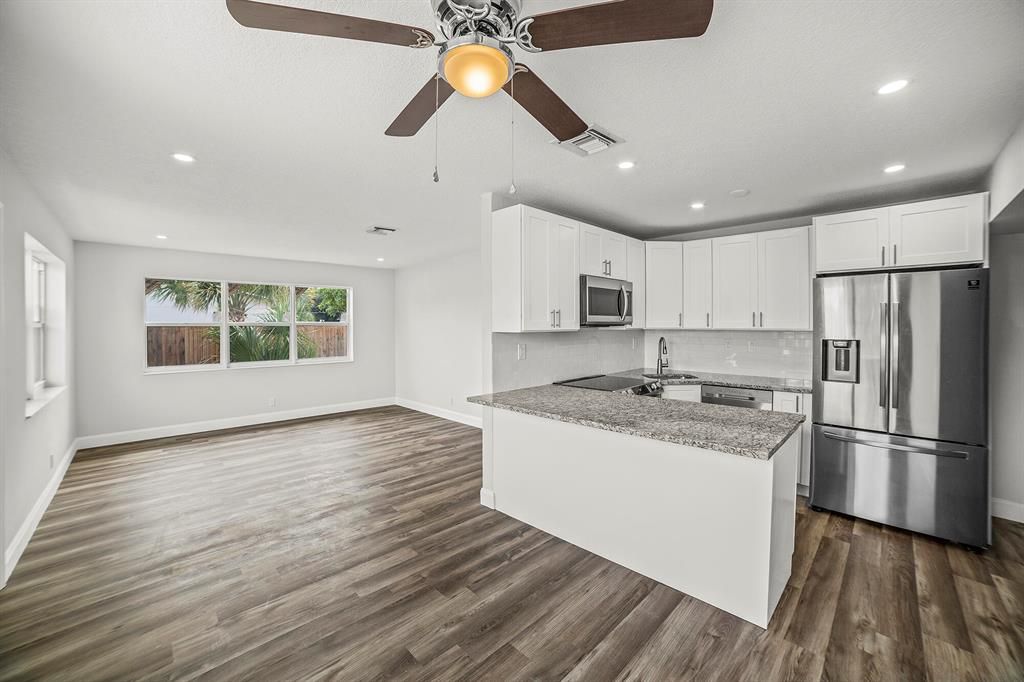 Photo of 920 Magnolia Drive, Lake Park, FL 33403 (MLS # R10726196)