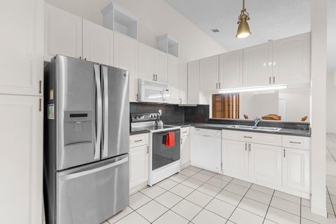 Tiny photo for 1001 NW 79th Avenue, Plantation, FL 33322 (MLS # B26076322)