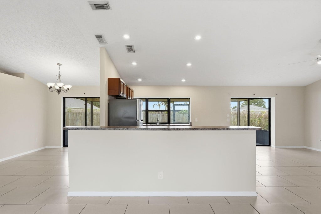 Photo of 682 SW JACOBY Avenue, Port Saint Lucie, FL 34953 (MLS # B26081432)