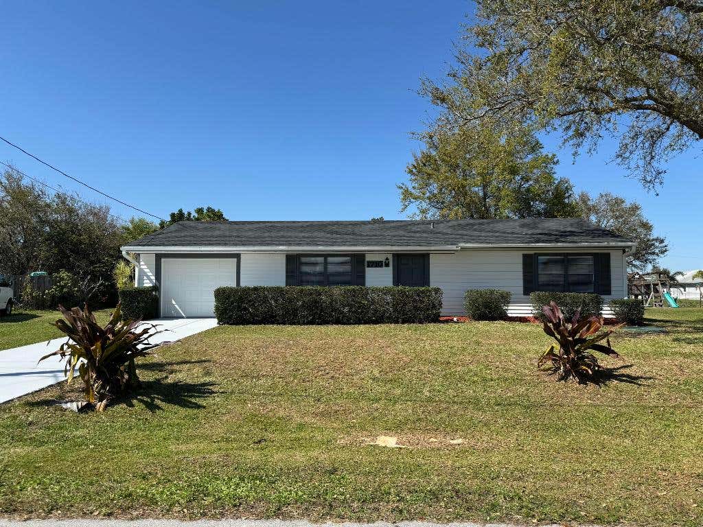 Photo of 1710 SW Monterry Lane, Port Saint Lucie, FL 34953 (MLS # R10962662)