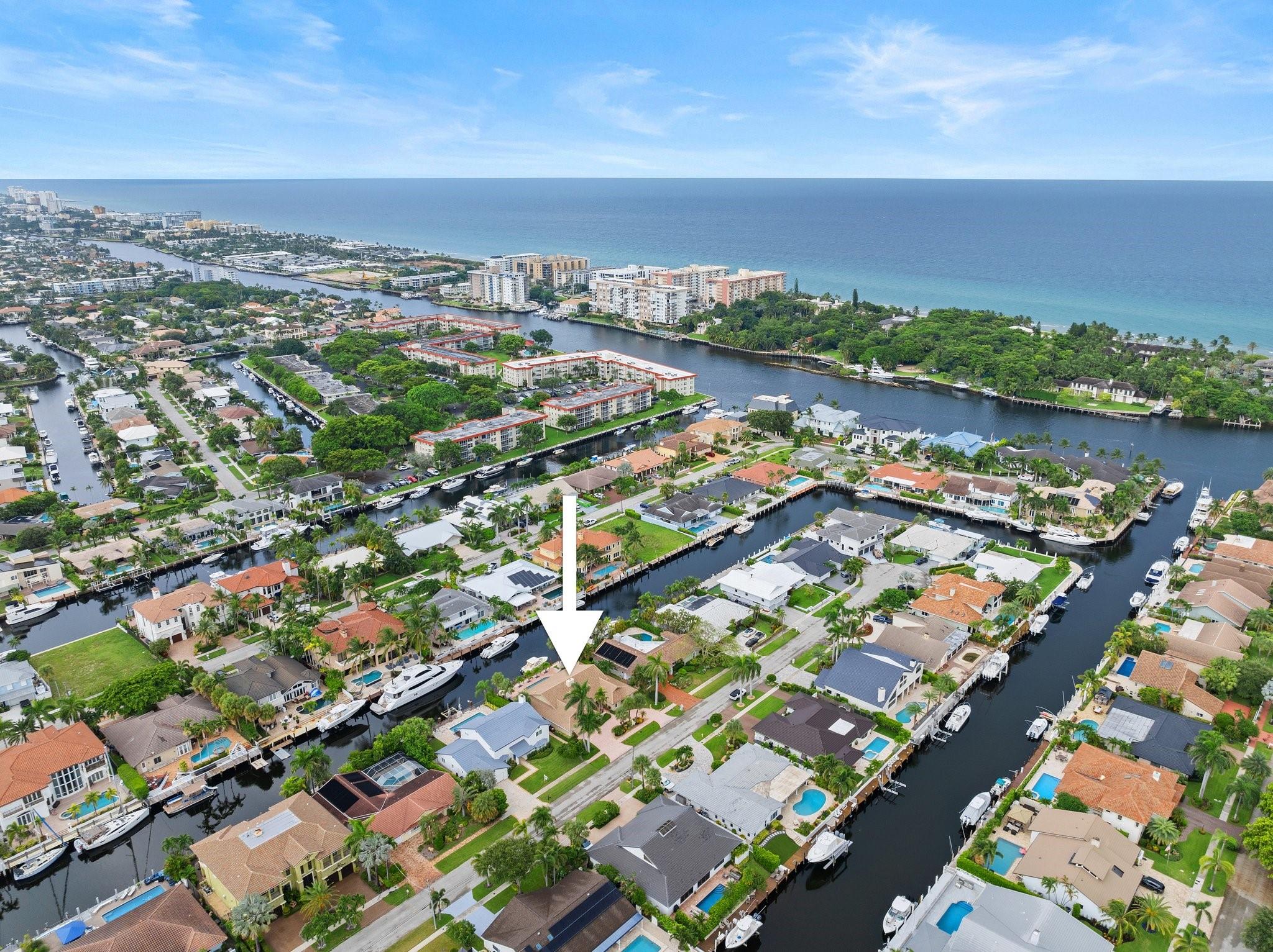 Located in the exclusive boating enclave of Lighthouse Point, this stunning 3BR/3BA waterfront home is just 10
minutes from the Hillsboro or Boca Inlet. Nestled at the end of 47th Island Street, this spacious property sits on an
85 x 110 lot w/ 3,053SF of living space & soaring 18’ ceilings. The home boasts a ground-up, permitted restoration
completed in 2012-2013, featuring a new roof, all impact windows and doors, a gourmet kitchen, major electrical rewiring, new hardwood flooring & three updated baths. Additional highlights include plantation shutters, a 10,000lb
boat lift installed in 2017, a batter pile seawall, and two brand-new RUUD A/C units (2023). The oversized 2-car
garage and dual hot water heaters add to the convenience of this meticulously maintained home.