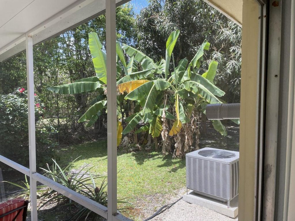 Photo of 6575 NE 7th Avenue, Boca Raton, FL 33487 (MLS # R11165640)