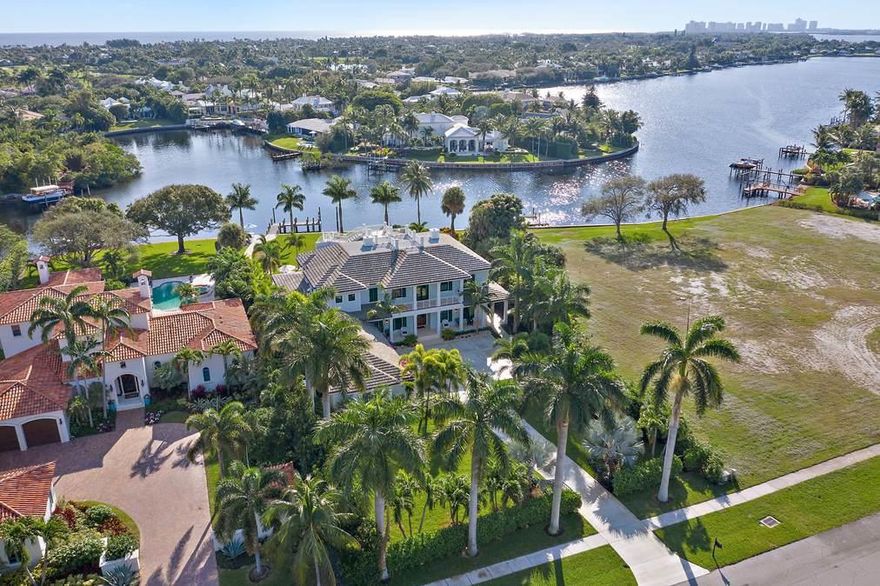 Located in the wonderful gated waterfront community of Captains Key, 12132 Captains Landing is a custom 4BR/5BA home built on a .65 acre lot that overlooks little Lake Worth. The British West Indies inspired residence has a master bedroom on the 2nd floor plus an elevator, a brand new sea wall with 103' of frontage, full house generator, gas fireplace, 3.5 car garage, laundry on both floors, extended covered patio and generous backyard. The second floor is complemented with an oversized covered balcony and a rooftop crow's nest to take full advantage of the long southern water views. The private dock makes this property perfect for anyone that enjoys boating ( up to est. 39' boat) and water sports with close proximity to intracoastal waterway & Atlantic ocean.