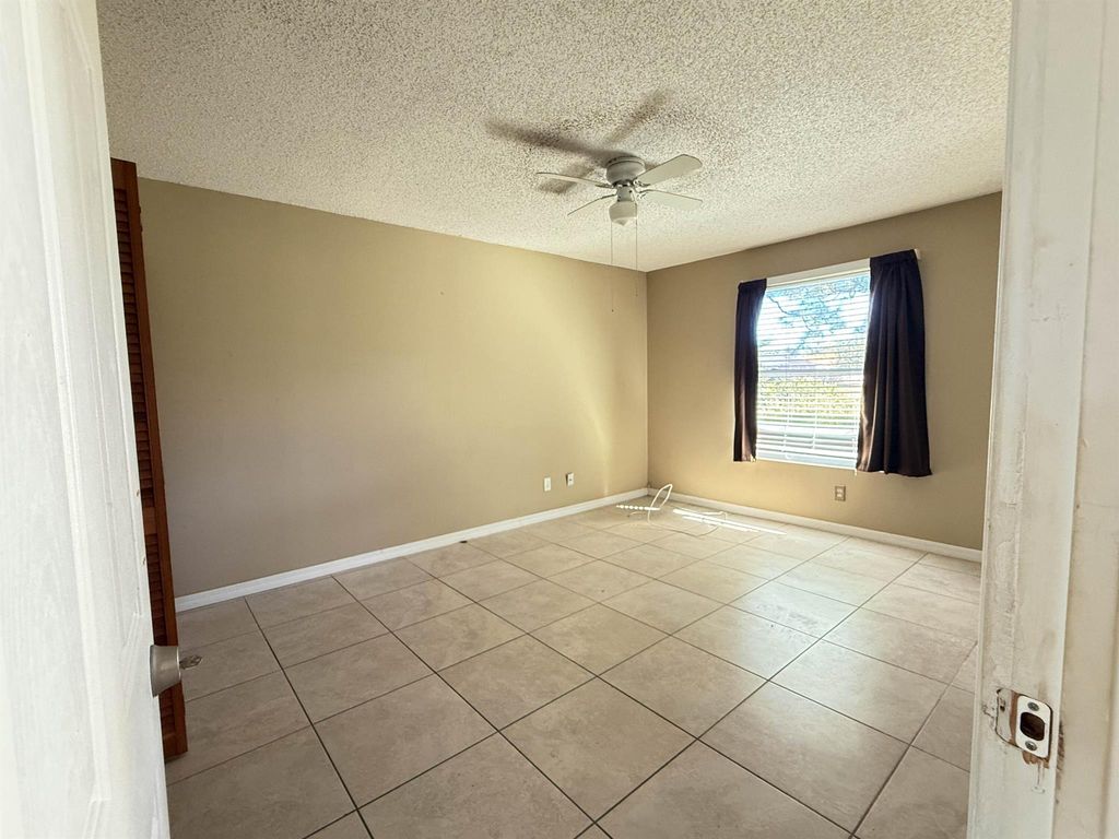 Photo of 1997 SE Burgundy Lane, Port Saint Lucie, FL 34952 (MLS # R11135132)