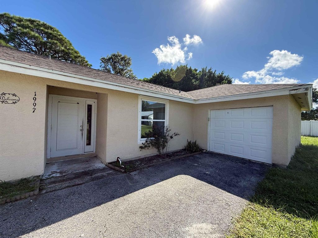 Photo of 1997 SE Burgundy Lane, Port Saint Lucie, FL 34952 (MLS # R11135132)