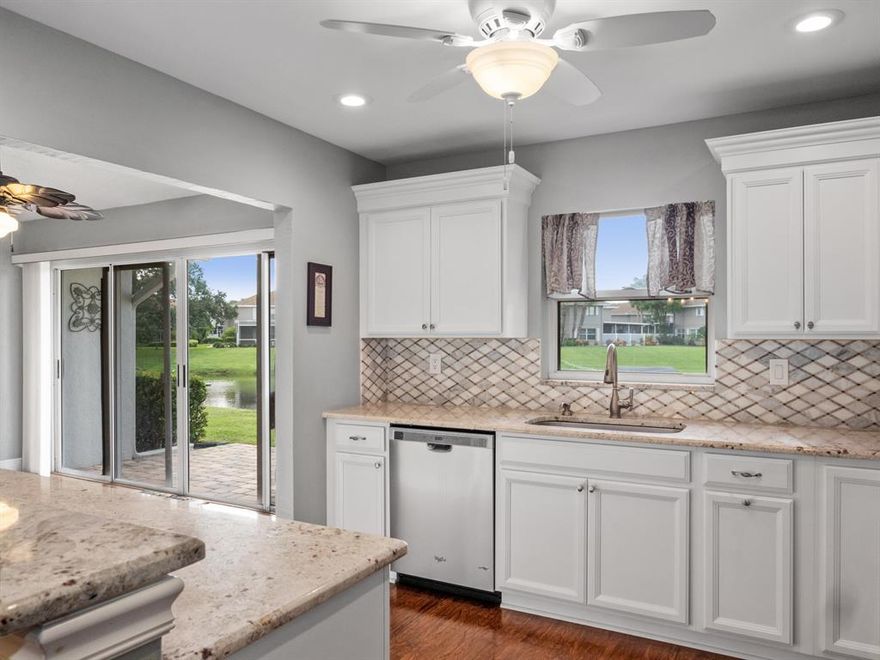 3/2 with garage in highly desirable Sunset Trace. This updated eat in kitchen offers new cabinets with crown molding, granite countertops, tile backsplash, & S/S appliances. This open concept home features vaulted ceilings, laminate wood plank flooring throughout, & recessed lighting. Master has a walk in closet, master bathroom offers dual vanity with free standing shower. Enjoy peace and tranquility with lake views. Neighborhood offers tennis courts, two pools, manned guard gate, & playground. Close to 95 & turnpike for an easy commute. A rated schools. Very highly desirable location.