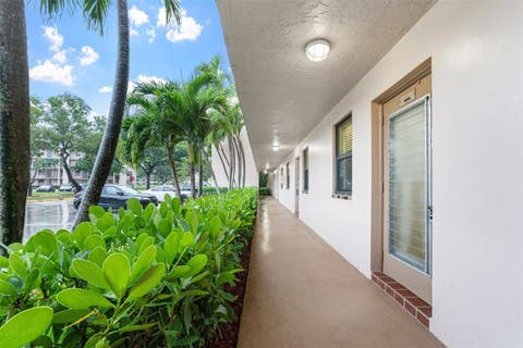Photo of 10402 Sunrise Lakes Boulevard #104, Sunrise, FL 33322 (MLS # F10540143)