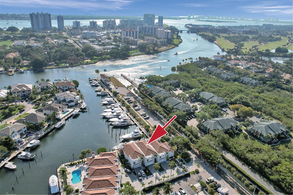 Boaters Dream. No Fixed bridges. Clear sailing to open water. The canal is wide with a turning basin for larger yachts. Enjoy care free living in elite gated waterfront community in the pulse of town. Upon entering the home an expansive water view stirs your senses. Private 50 ft dock outside your door with water & electricity. Maximum boat length allowed is 45'. Sunny terrace and summer kitchen. The community has a chic contemporary cachet. The home embraces a cool coastal feel. 2022 roof replaced, a/c and water heater, newer appliances.