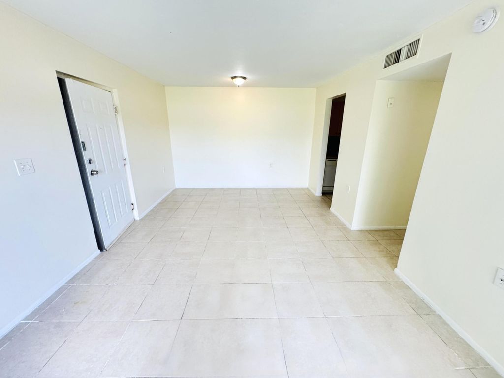 Photo of 1101 N Benoist Farms Road #106, West Palm Beach, FL 33411 (MLS # B26030531)