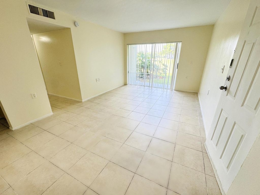 Photo of 1101 N Benoist Farms Road #106, West Palm Beach, FL 33411 (MLS # B26030531)