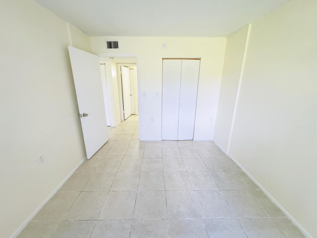 Photo of 1101 N Benoist Farms Road #106, West Palm Beach, FL 33411 (MLS # B26030531)