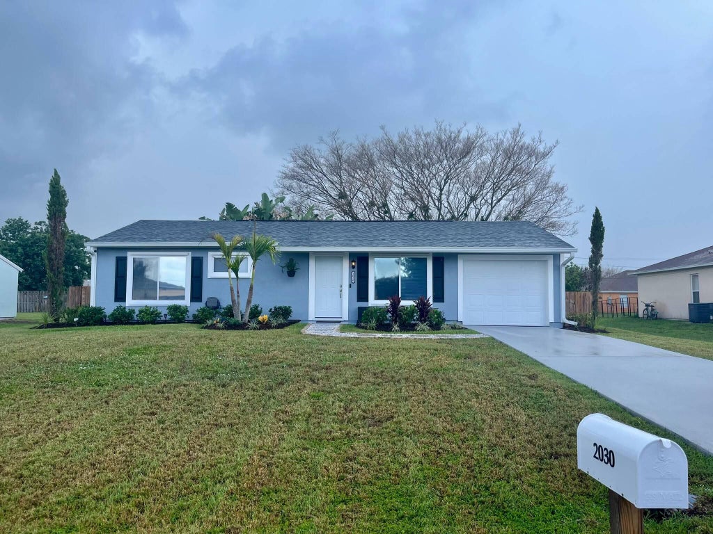 Photo of 2030 SE Watercrest Street, Port Saint Lucie, FL 34984 (MLS # B26050296)