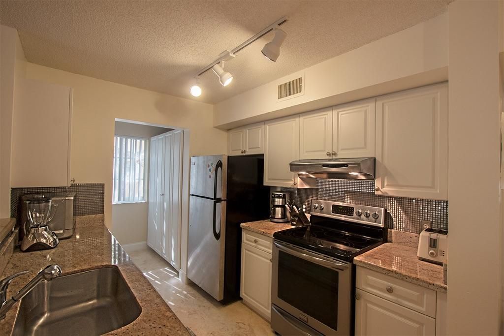 Photo of 160 Yacht Club Way #212, Hypoluxo, FL 33462 (MLS # R10985536)