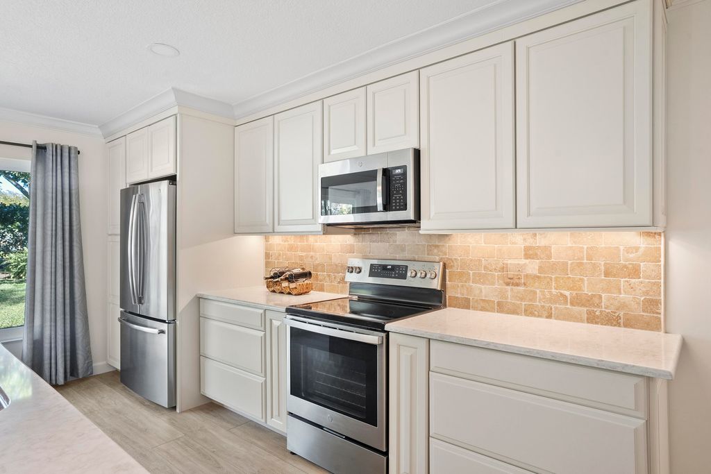 Photo of 1309 NE 29th Terrace, Jensen Beach, FL 34957 (MLS # R11159172)