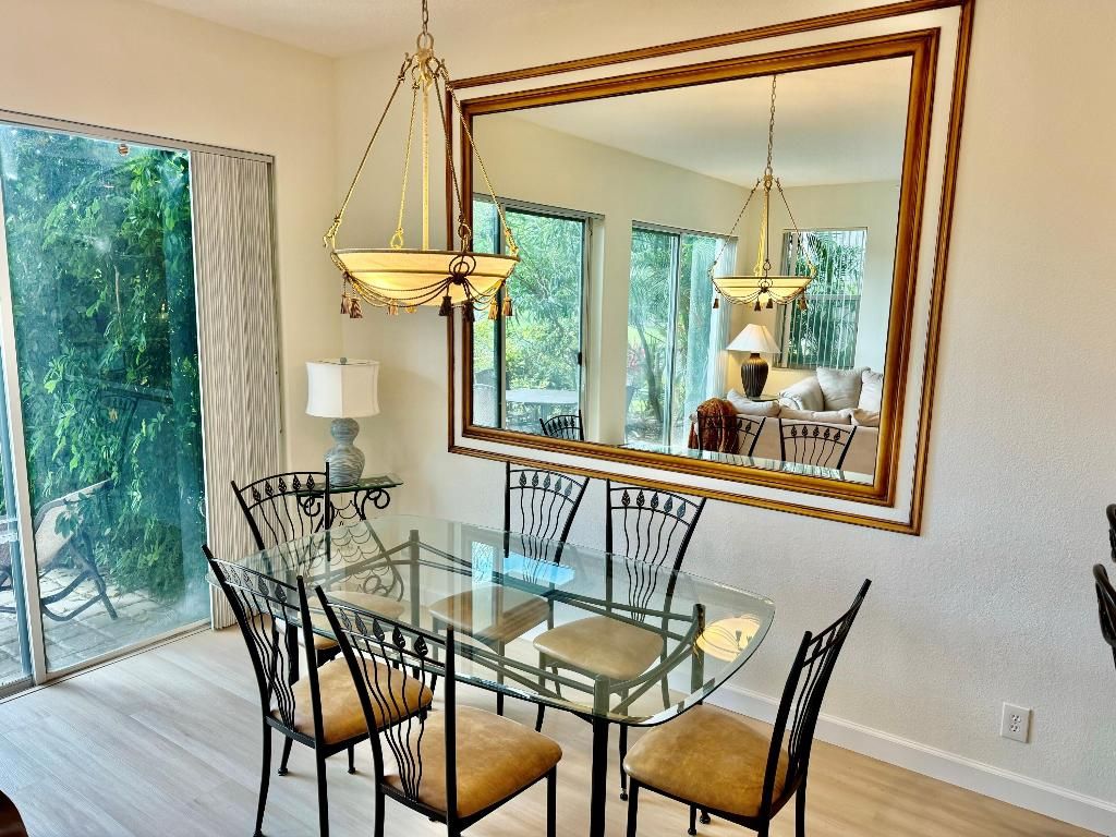 Photo of 107 Resort Lane, Palm Beach Gardens, FL 33418 (MLS # R11158943)