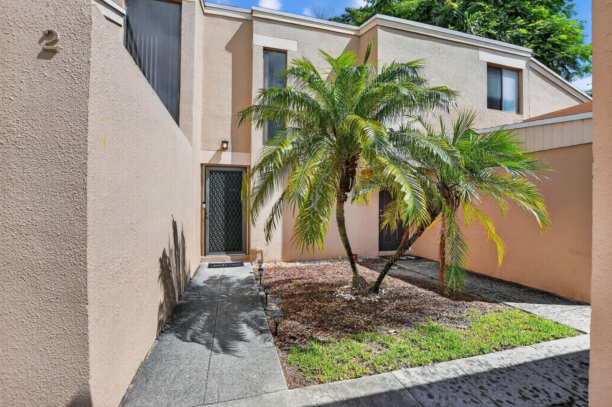 Welcome to this beautifully maintained 3BR/2BA townhouse in the heart of Boca Raton! Enjoy a first-floor primary suite, newer stainless steel appliances (2020+), 2024 water heater, 2016 AC, in unit washer and dryer, and a private screened-in patio--perfect for relaxing or entertaining. Upstairs offers two spacious bedrooms, ideal for guests, family, or a home office. Located in an all-ages, pet-friendly community with tennis courts, a sparkling pool, and scenic green spaces. Minutes from A-rated schools, FAU, shopping, dining, downtown Boca, beaches, and major highways. Water included in maintenance. Whether you're looking for a primary residence, or a seasonal retreat, this townhome delivers the perfect blend of comfort, convenience, and lifestyle.