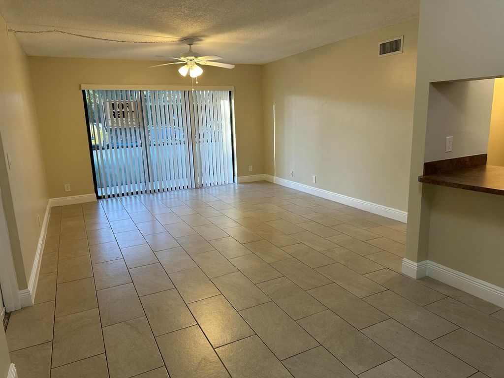Photo of 202 Foxtail Drive #A1, Greenacres, FL 33415 (MLS # R11163027)