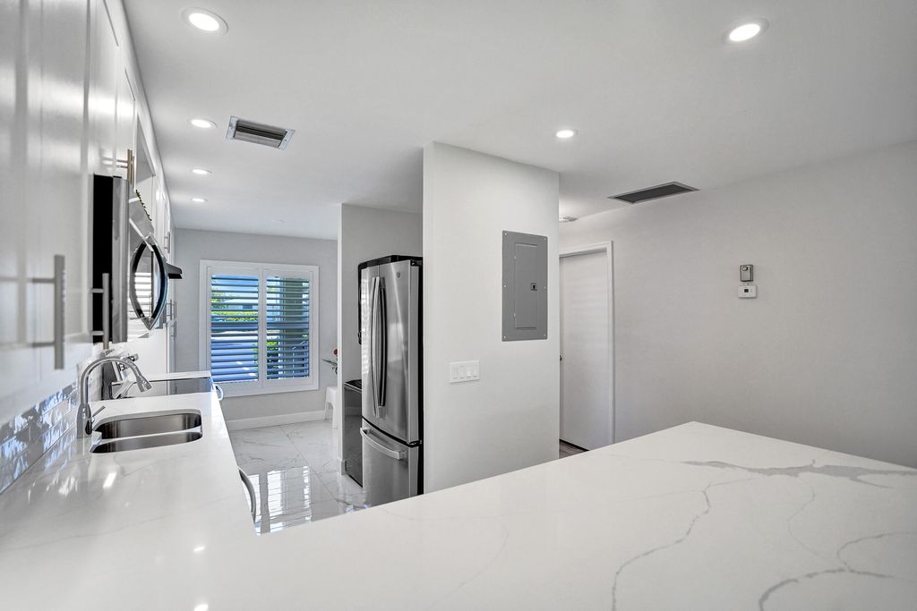 Photo of 1150 Boxwood Drive #101, Delray Beach, FL 33445 (MLS # R11092142)