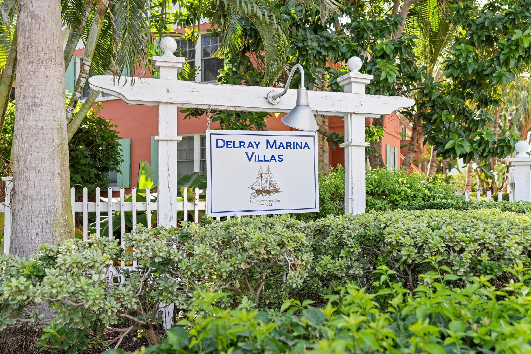 Within the Marina Historic District neighborhood, Delray Marina Villas is a historic gem. Surrounded by lush, tropical gardens with hibiscus, citrus and avocado trees. Chicago brick walkways lead you to your Villa and the subtle fragrance of an exotic ylang-ylang tree perfumes the air. Villa 4 is a charming second floor 2/1, with historic details, 2 large bedrooms, cozy sitting room and kitchen with all of the essentials. Enjoy the warm breeze from a small balcony outside the front door with garden and neighborhood views through the palms. One block from vibrant Atlantic Ave. and municipal marina, the location is beautifully situated within a pretty residential neighborhood. Shopping, fine dining, the beach, all very easily accessed. Discover a truly authentic Delray Beach.