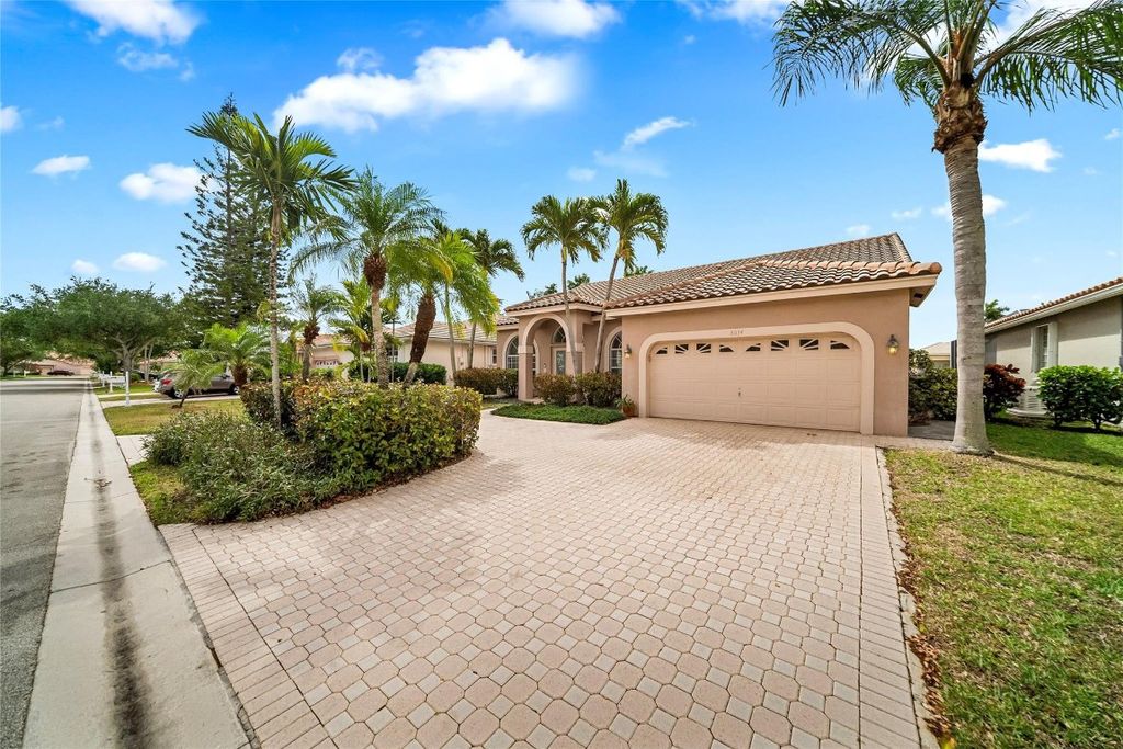 Photo of 6034 NW 74th Street, Parkland, FL 33067 (MLS # F10496436)
