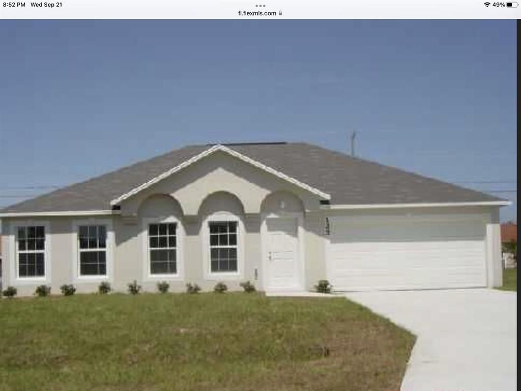 Photo of 125 SW Covington Road, Port St Lucie, FL 34953 (MLS # R10864643)
