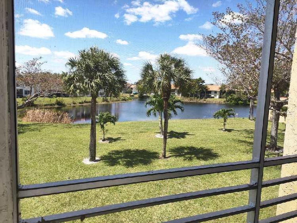 Photo of 317 Lake Evelyn Drive, West Palm Beach, FL 33411 (MLS # R10793010)