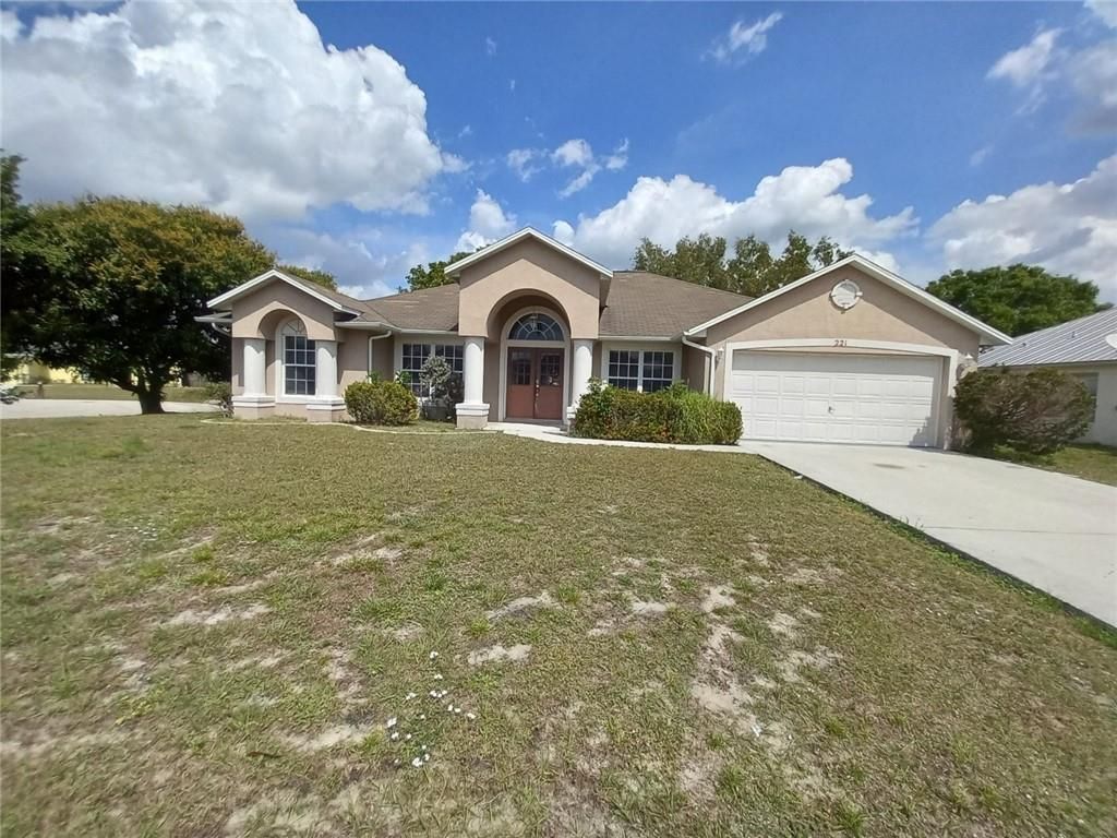 Photo of 221 SW Amesbury Ave, Port Saint Lucie, FL 34953 (MLS # F10320987)
