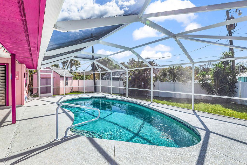 Photo of 2024 NE 24th Street, Jensen Beach, FL 34957 (MLS # B26019309)