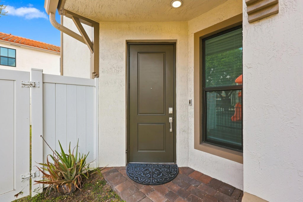 Photo of 2011 Tamarind Drive, Riviera Beach, FL 33410 (MLS # B26068678)