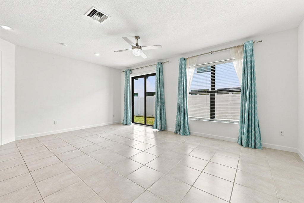 Photo of 2011 Tamarind Drive, Riviera Beach, FL 33410 (MLS # B26068678)