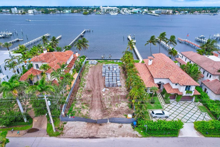 Direct intracoastal cleared lot in a no wake zone with permit to build massive waterfront estate ready to go! Prime Hypoluxo island location! Walk to the beach, Eau Resort & Spa, and top dining spots. Just 1.5 mi to I-95, minutes to PBI & private jet access. This is the only direct intracoastal lot for sale on coveted Hypoluxo Island.. Call today this will go very quickly!