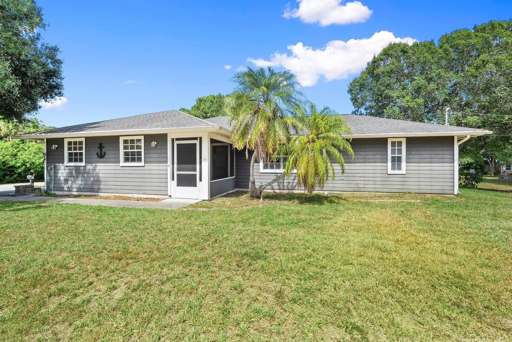 Photo of 7205 Plumosa Lane, Fort Pierce, FL 34951 (MLS # R11104613)