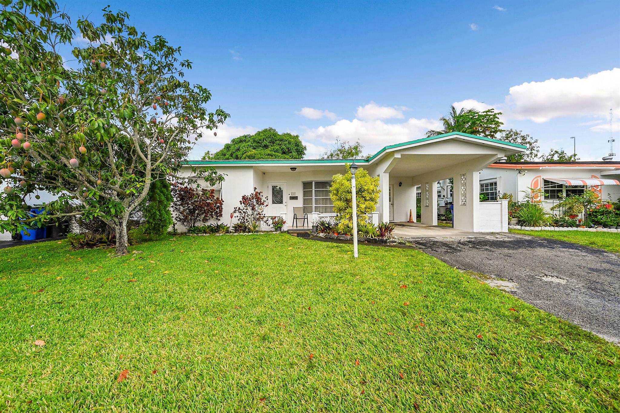 This 55+ Oakland Estates features 2 bedrooms and 2 full bathrooms within a spacious 1,442 square foot layout, this residence is well-suited for individuals seeking a tranquil and convenient living environment in Lauderdale Lakes. Thoughtfully designed living area featuring light wood-style tile flooring and recessed lighting, providing ambiance. The kitchen is equipped with modern stainless steel appliances, light stone countertops, and a decorative backsplash.. The dining area invites ample natural light, creating a pleasant setting for meals. The primary suite includes an ensuite bathroom with elegant tile work and a spacious shower. The enclosed patio extends the living space outdoors, perfect for entertaining or to be used a home office. Fully renovated with brand new 2023 roof..