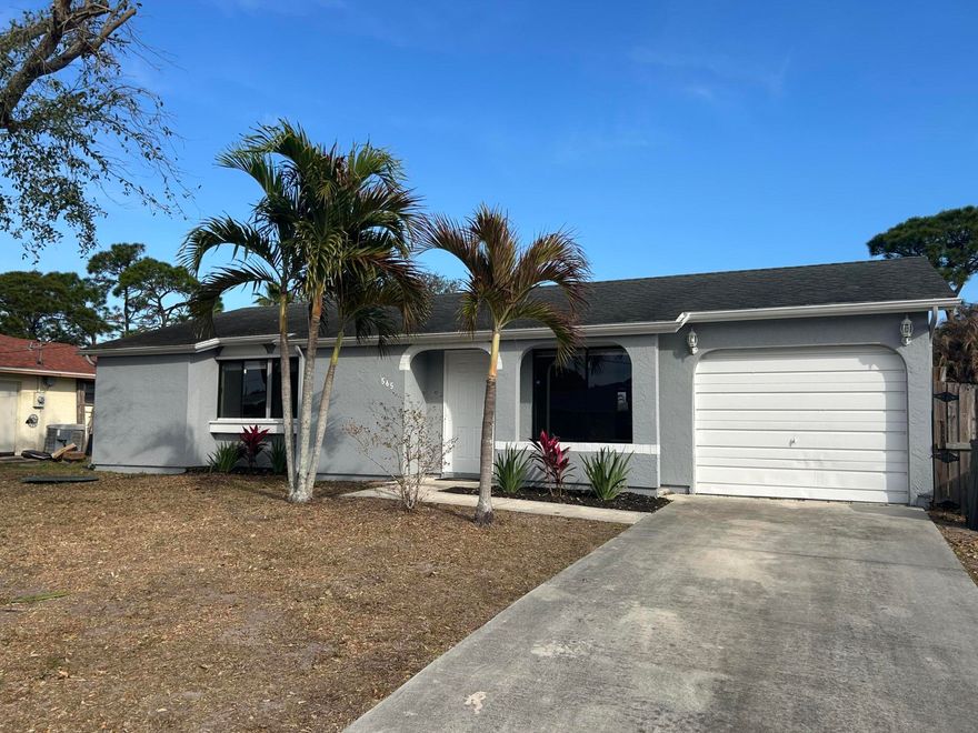 Discover this cozy and clean 3-bedroom, 2-bathroom single-family home, perfectly situated in the heart of Port St. Lucie. This inviting property features newer flooring, a beautifully remodeled kitchen, fresh paint, and updated baseboards, giving the home a modern yet comfortable feel. Enjoy the Florida lifestyle with a fully fenced, oversized backyard and a large screened-in patio, perfect for relaxing or entertaining. Additional highlights include a half-garage conversion offering extra storage and a utility room with air conditioning. The freshly painted exterior adds to this home's curb appeal. Lawn care is included, making maintenance a breeze. Renters must meet income requirements of 2.5 times the rent, have a good rental history, and no prior evictions. Qualified Candidate Only!