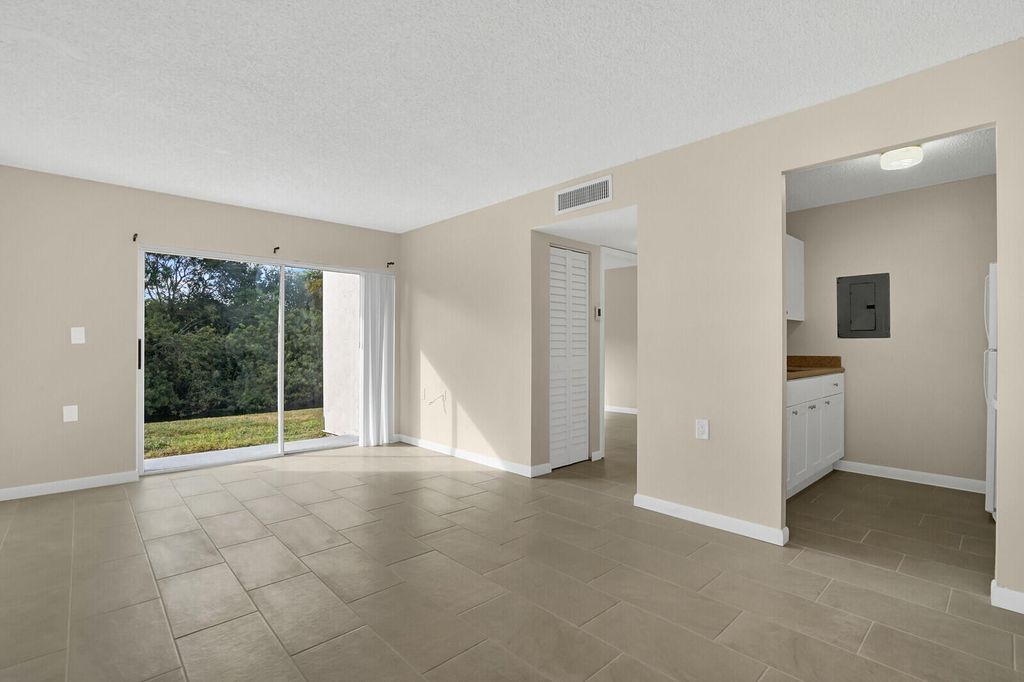 Photo of 1141 Lake Victoria Drive #A, West Palm Beach, FL 33411 (MLS # B26009492)