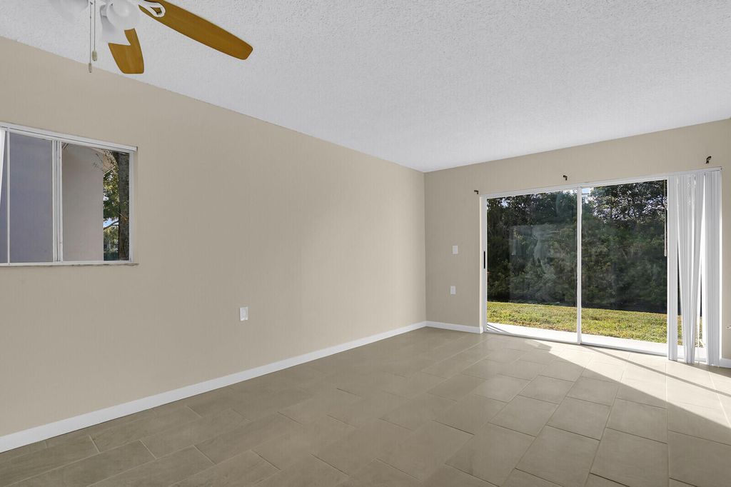 Photo of 1141 Lake Victoria Drive #A, West Palm Beach, FL 33411 (MLS # B26009492)
