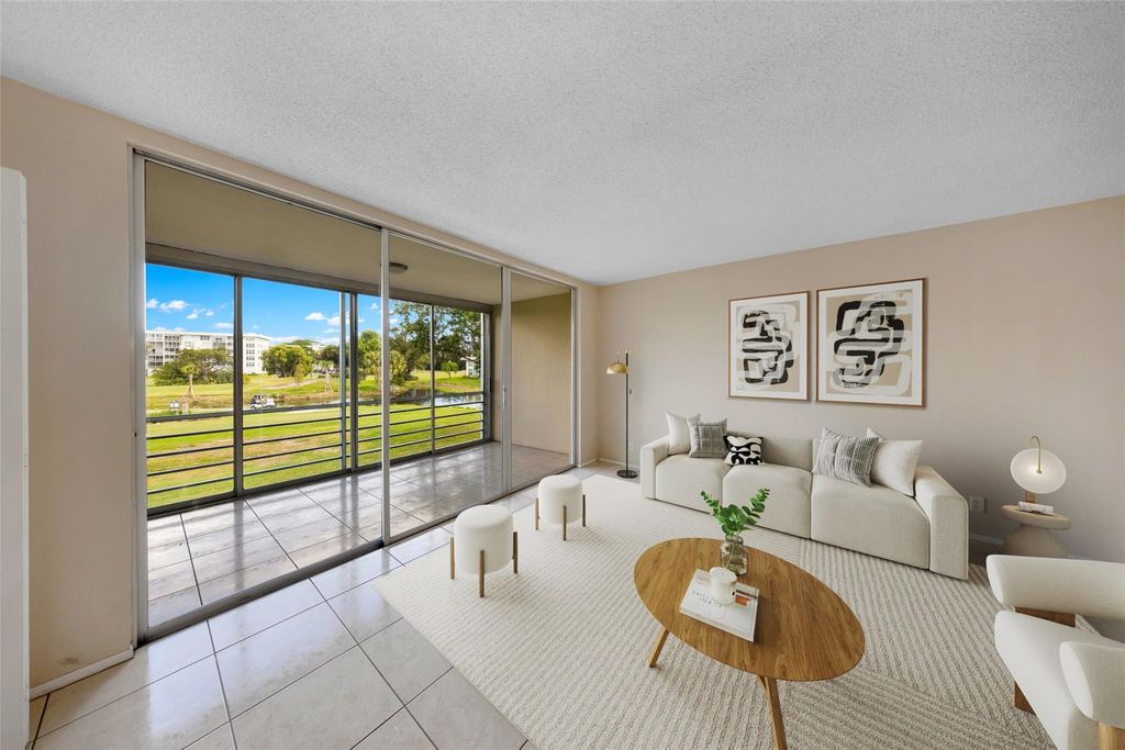Photo of 2601 S Palm Aire Dr #212, Pompano Beach, FL 33069 (MLS # F10532898)