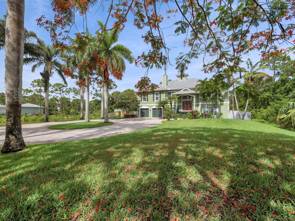 Photo of 7701 Silver Oak Drive, Port Saint Lucie, FL 34952 (MLS # R11098039)