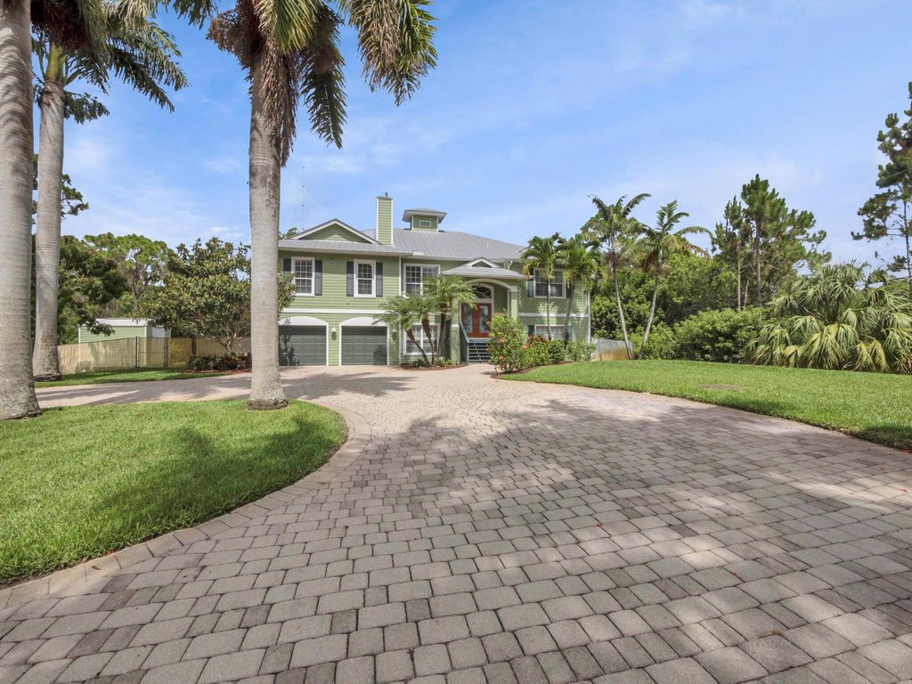 Photo of 7701 Silver Oak Drive, Port Saint Lucie, FL 34952 (MLS # R11098039)