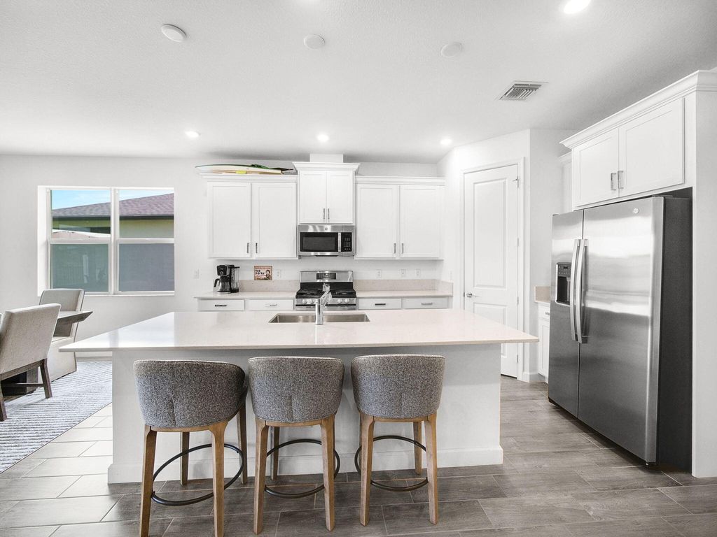 Photo of 1887 Wandering Willow Way, The Acreage, FL 33470 (MLS # R11150812)