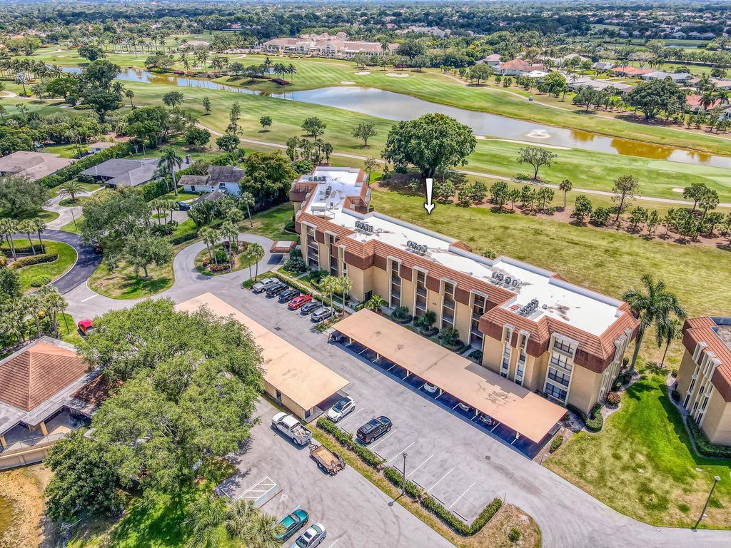 Photo of 5350 Woodland Lakes Drive #109, Palm Beach Gardens, FL 33418 (MLS # R11081035)